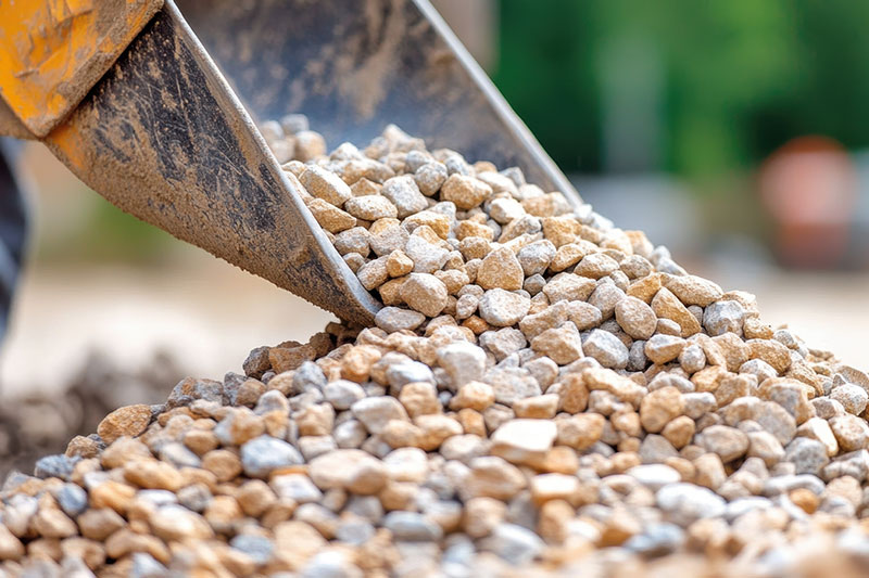 Construction equipment processing aggregate stone