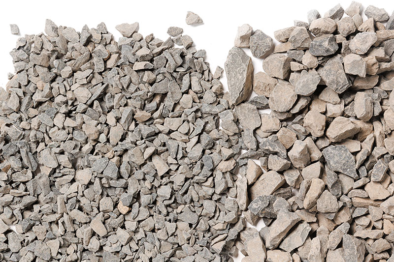 Piles of aggregate stone and limestone #57 stone