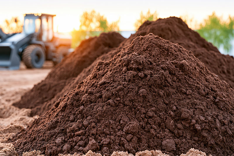 Loads of topsoil at a construction site near Tampa, Florida